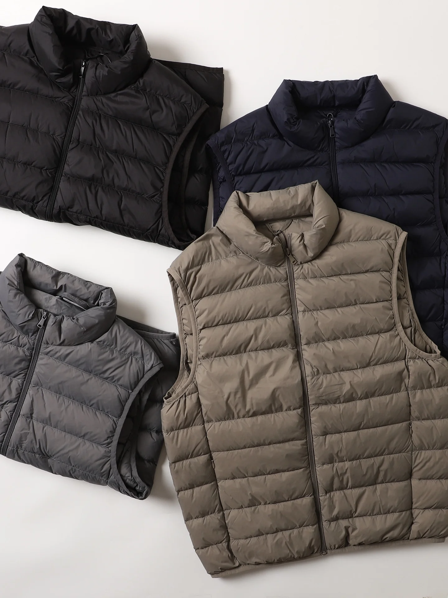 

Универсальный мужской пуховый жилет для повседневной носки: легкий, теплый, с воротником-стойкой, на пуху, для молодежи