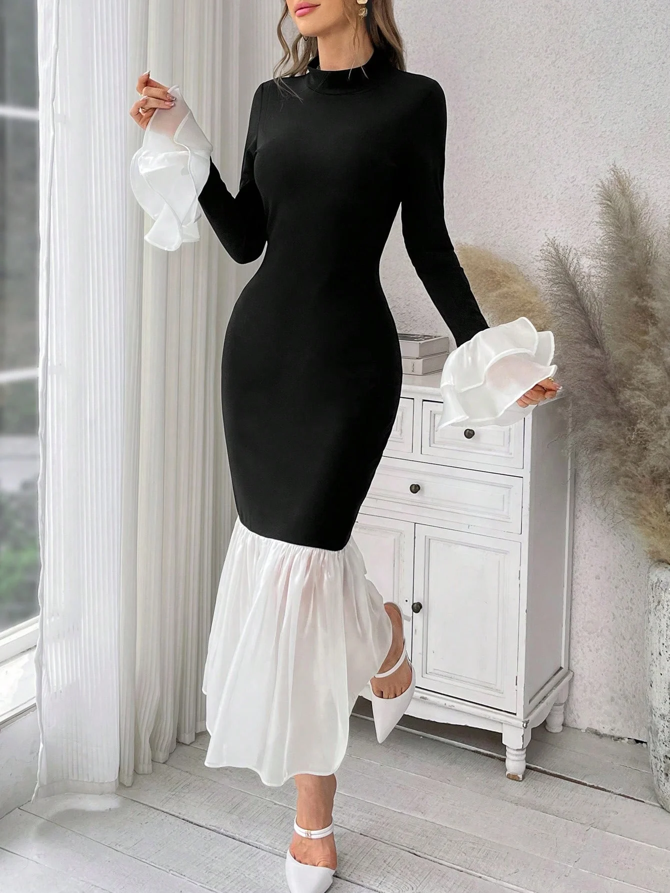 Winter Clothing Pinterest - A black and white contrast-stitched mesh