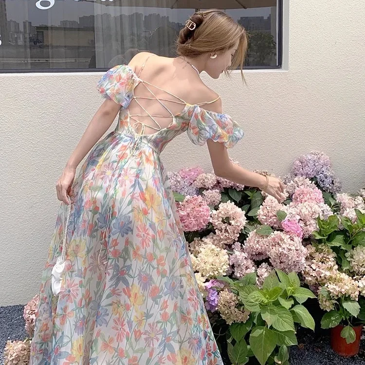 Vestido de mujer de manga larga con cuello en V hasta la rodilla estilo vacaciones en la playa vestido de cumpleaños con diseño sin espalda con estampado Floral de verano 2025 nuevo