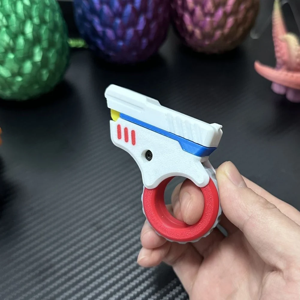 Spinner a mano in metallo stampato in 3D Riduzione efficace dello stress Anello agitatore a forma di pistola Giocattoli agitati per adulti per l'ansia e gli soppresori di ADHD