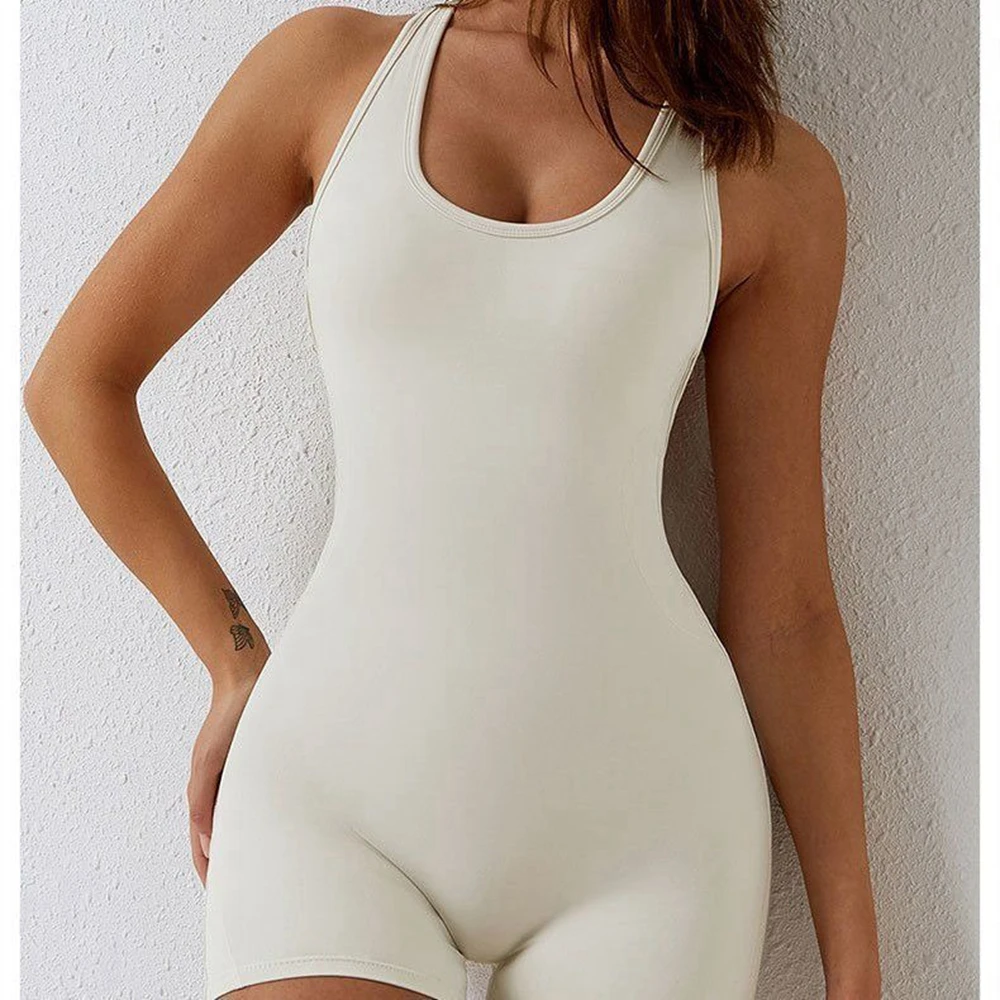 เสื้อกีฬาแขนสั้นรัดรูปสำหรับผู้หญิงชุดเล่นโยคะแบบชุดจั๊มสูทสั้นยืดได้ชุดเล่นกีฬาแขนกุดเซ็กซี่ฟิตเนสผู้หญิงรุ่นพื้นฐาน