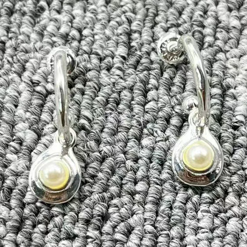 

Новинка 2022 г., изысканная модная гальванизированная Серебряная белая круглая серьга unode 50 с кристаллами, женский подарок