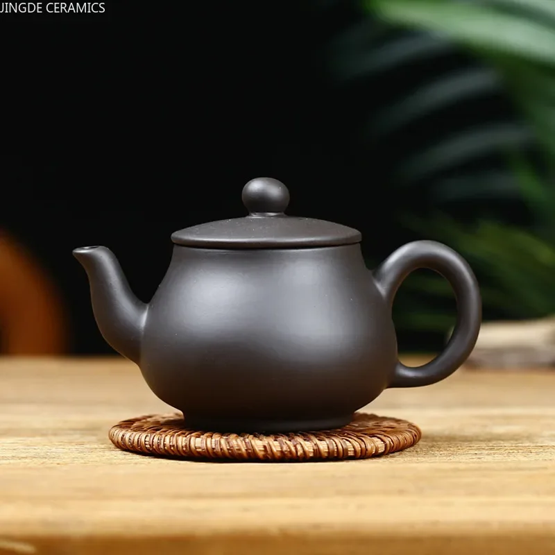 Tetera Yixing auténtica de 160ml, tetera de arcilla púrpura, tetera de mineral crudo, tetera china hecha a mano, corbata, ceremonia del té Guanyin