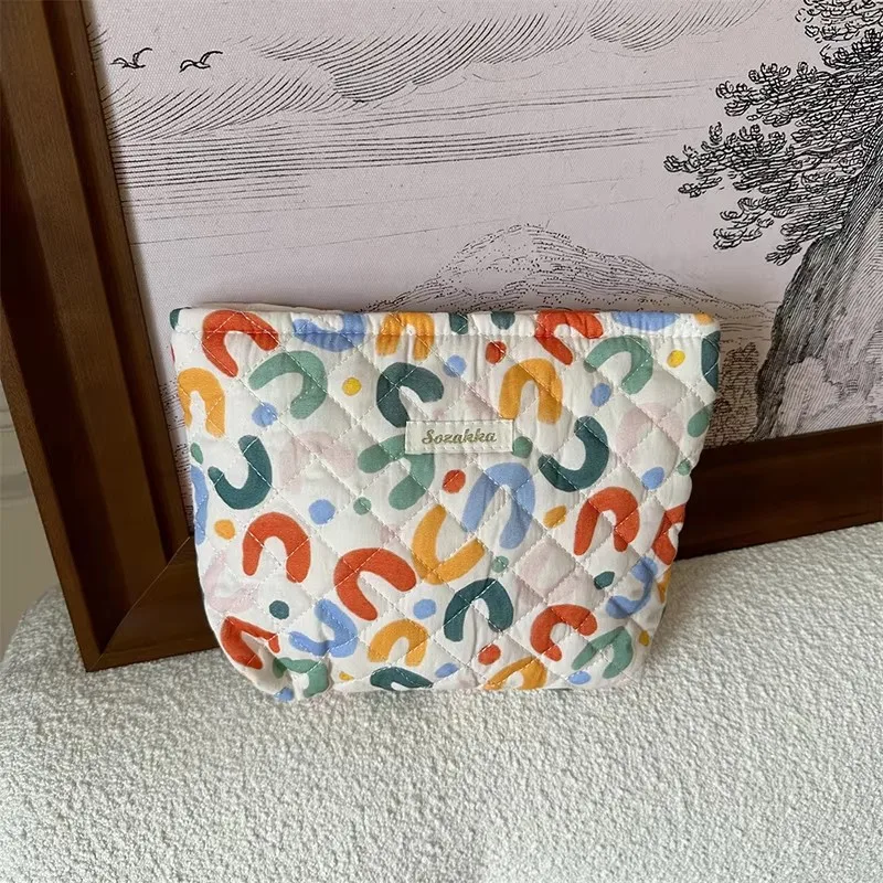 حقيبة تخزين جديدة ذات سعة كبيرة من القطن المبطن على شكل زهرة كرتونية - حقيبة أدوات الزينة اللطيفة والمحمولة للعناية بالبشرة