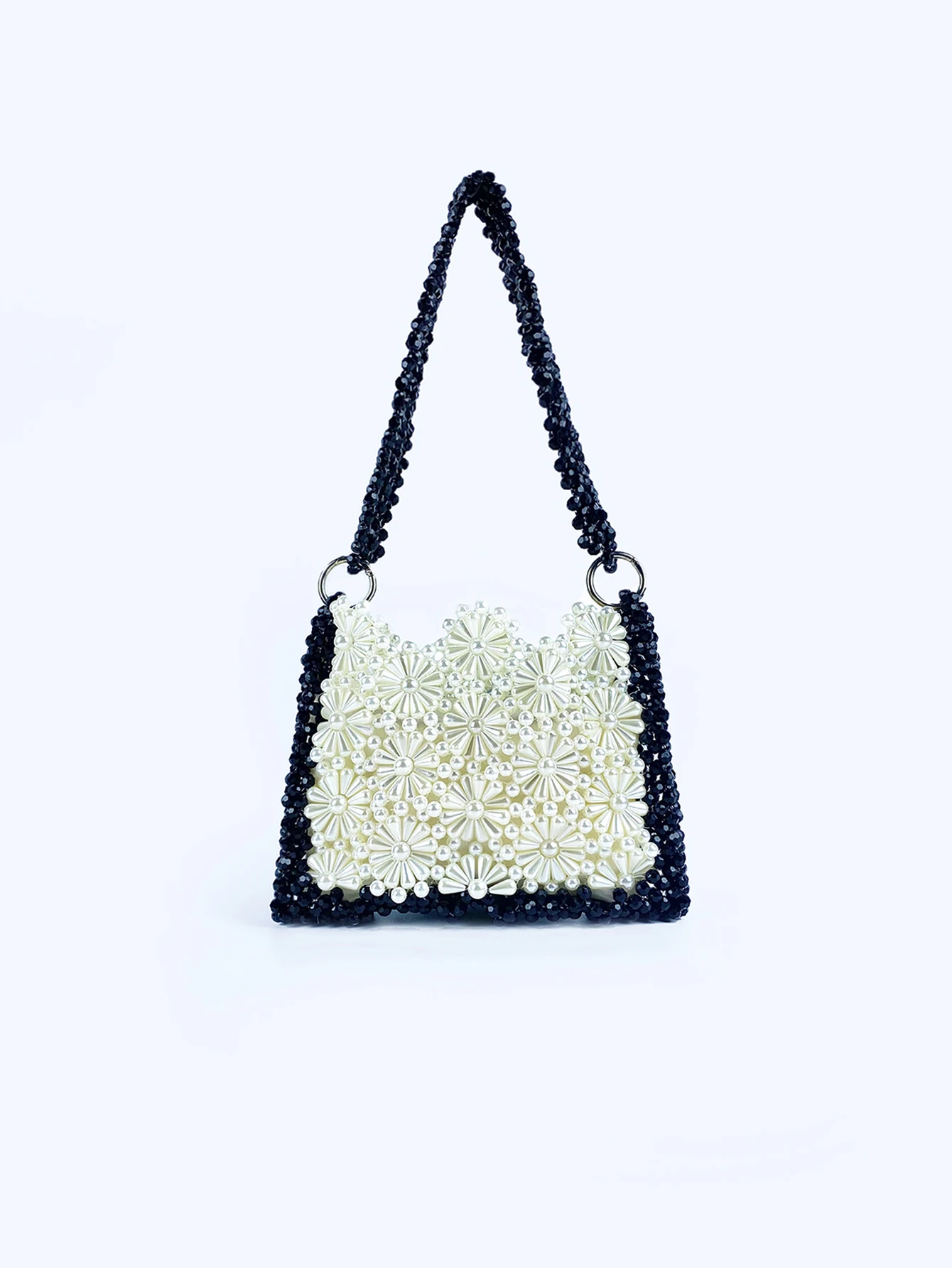 European and American fashion retro hollowed out pearl beaded woven floral black and white contrasting versatile shoulder bag