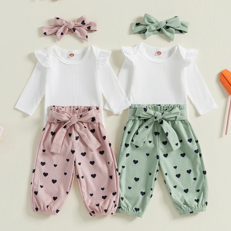 

2024-09-03 Lioraitiin 0-18M Baby Girls Clothes Sets Ruffle Long Sleeve Solid Ribbed Romper Heart Print Pants Tie Headband Belt