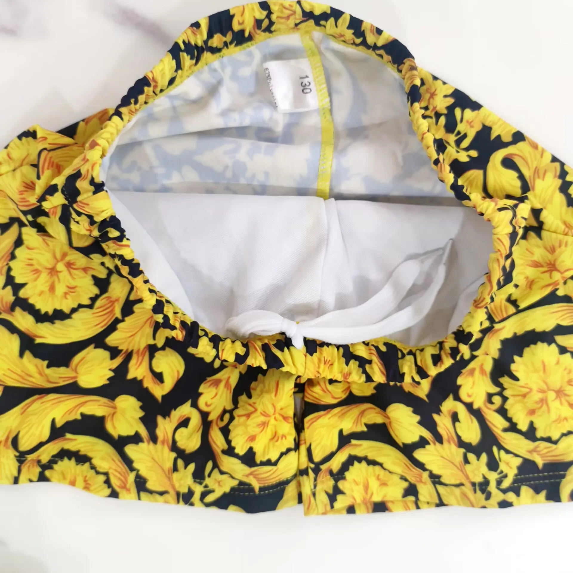 2025 Pantaloncini da bagno per bambini Maschio Baby Jacquard dorato Primavera calda Abbigliamento da bagno per babay 1-12 anni