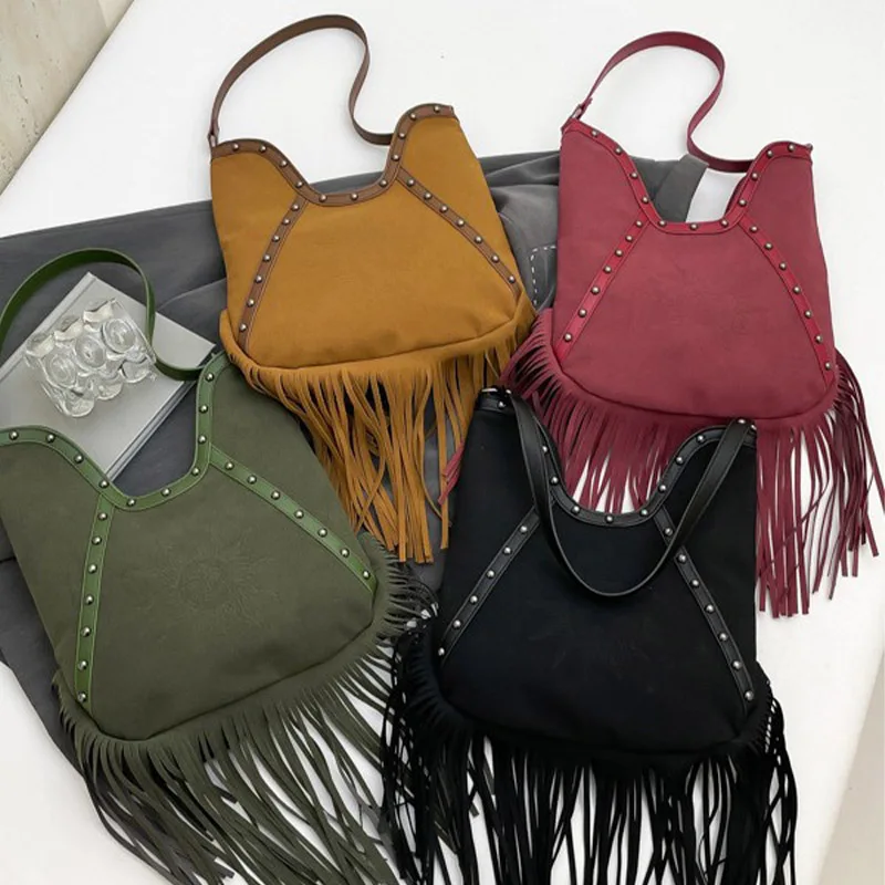 

European and American fashion solid color retro rivet tassel large capacity handbag new bohemian style multifunctional crossbody