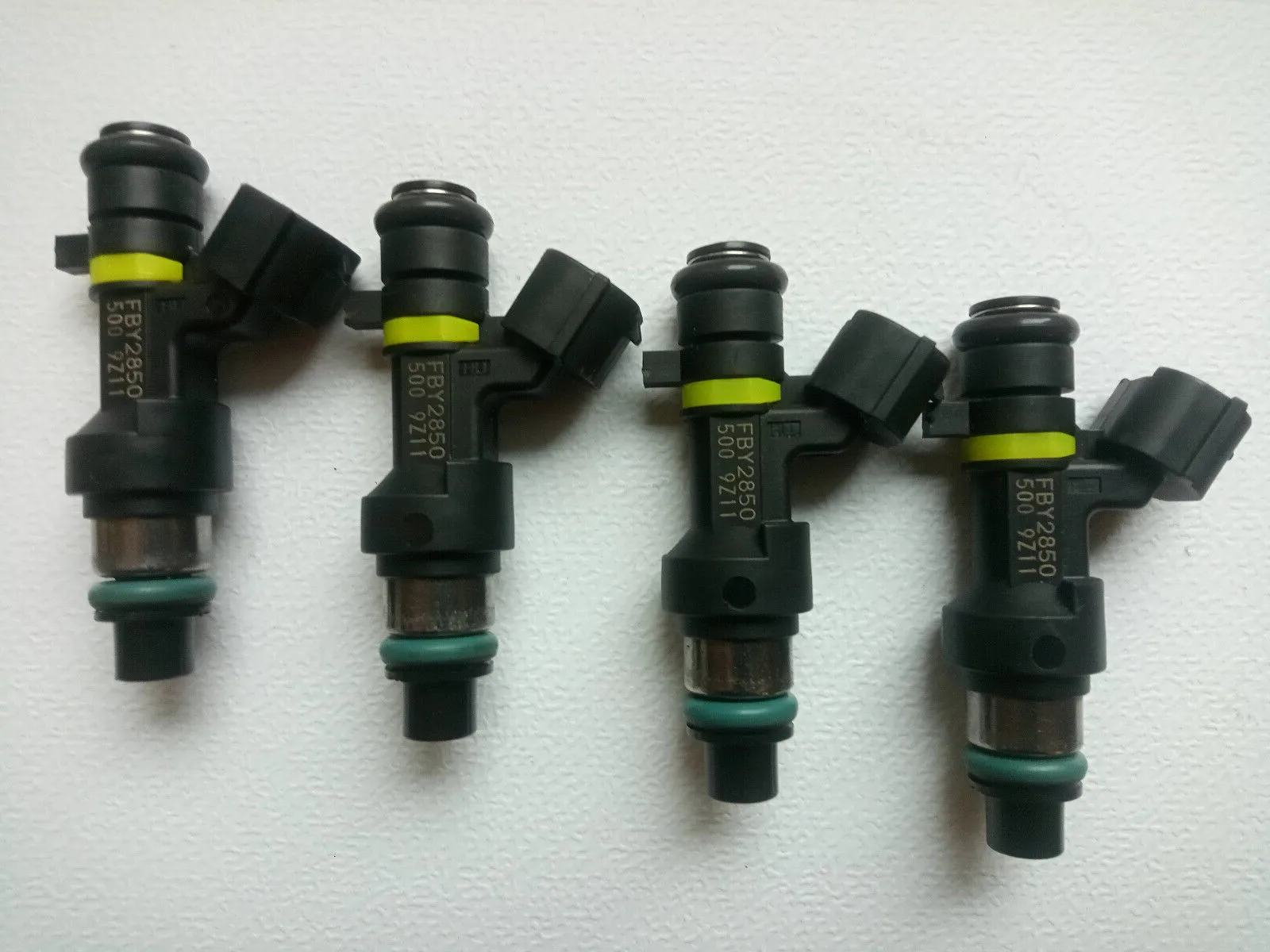 New set of 4 Fuel Injectors FBY2850 16600EN200 For NISSAN 1.8 2.0 VERSA QASHQAI