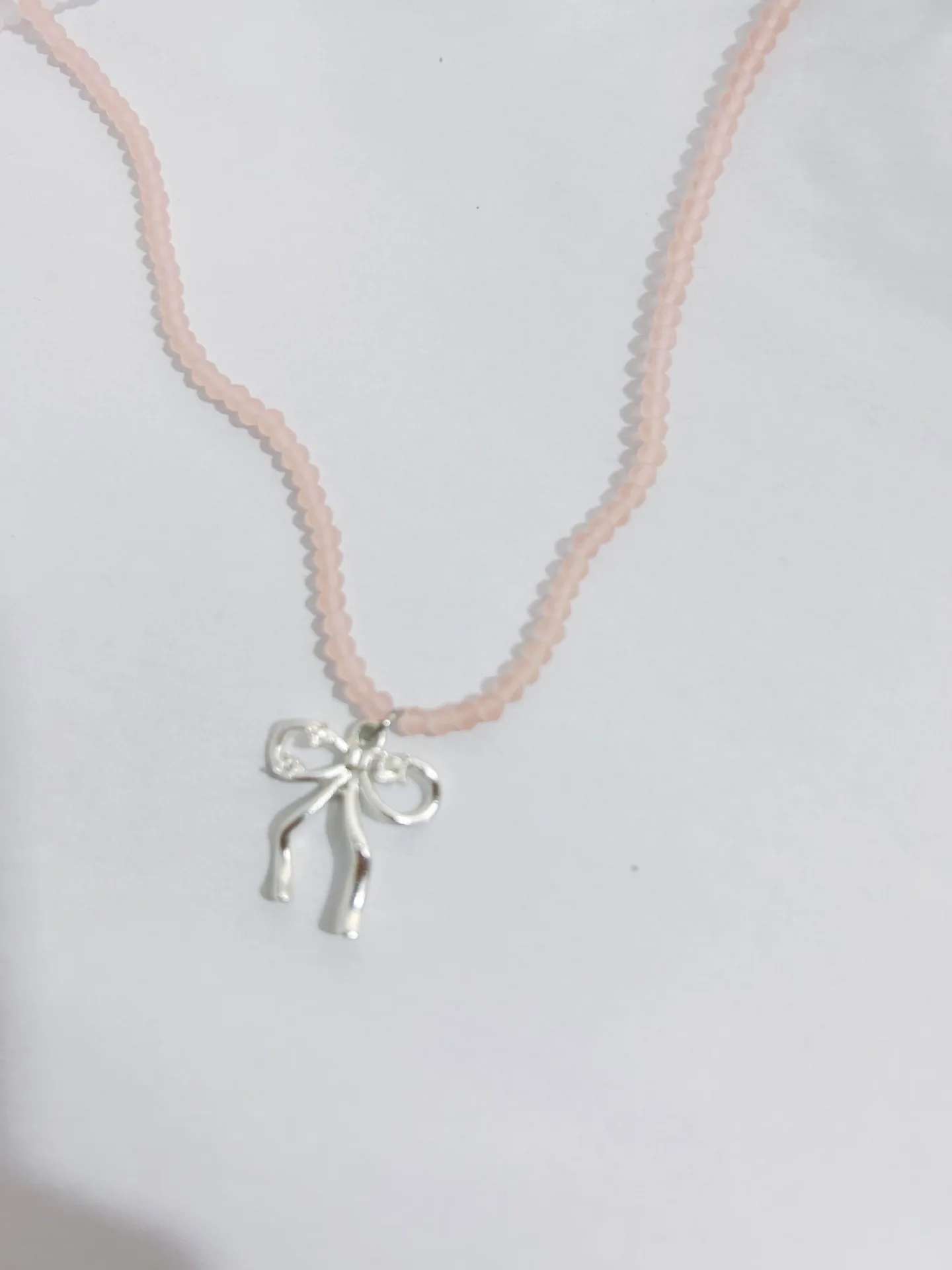 Collier perlé avec nœud en sel de mer, bonbon dopamine, clavicule empilée, frais et doux, vente en gros, vente directe, été, nouveau