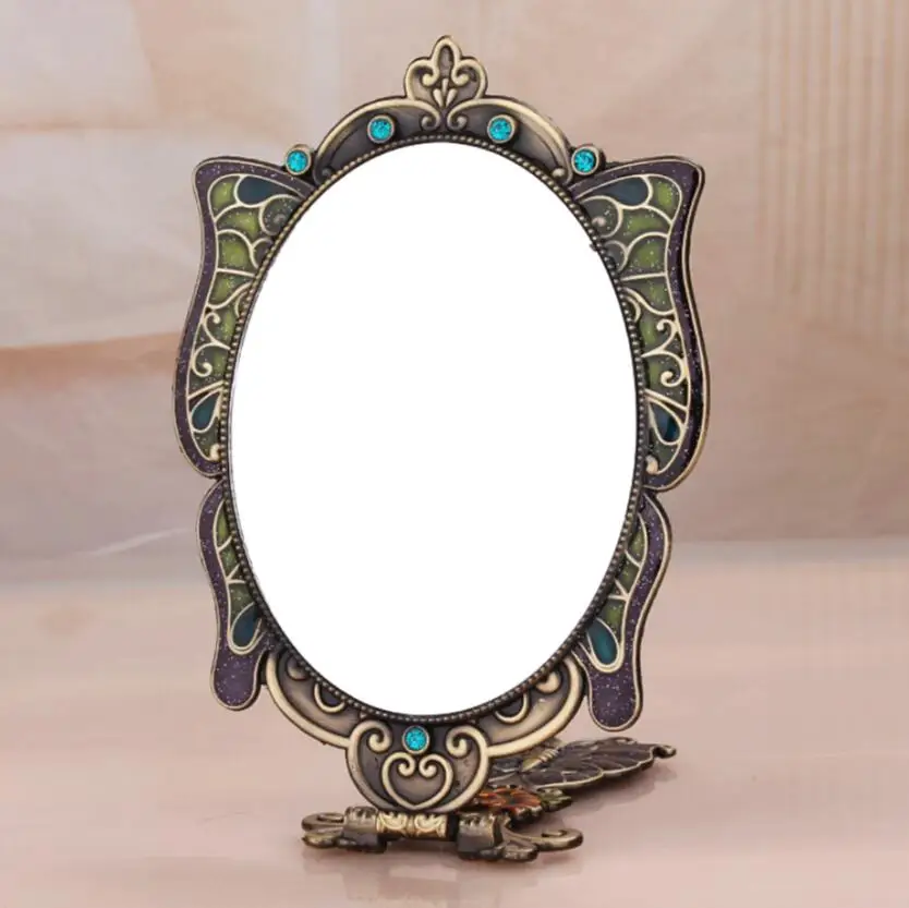 High quality desktop cosmetic princess lens portable handle can fold and hold a vintage peacock imitation copper mirror