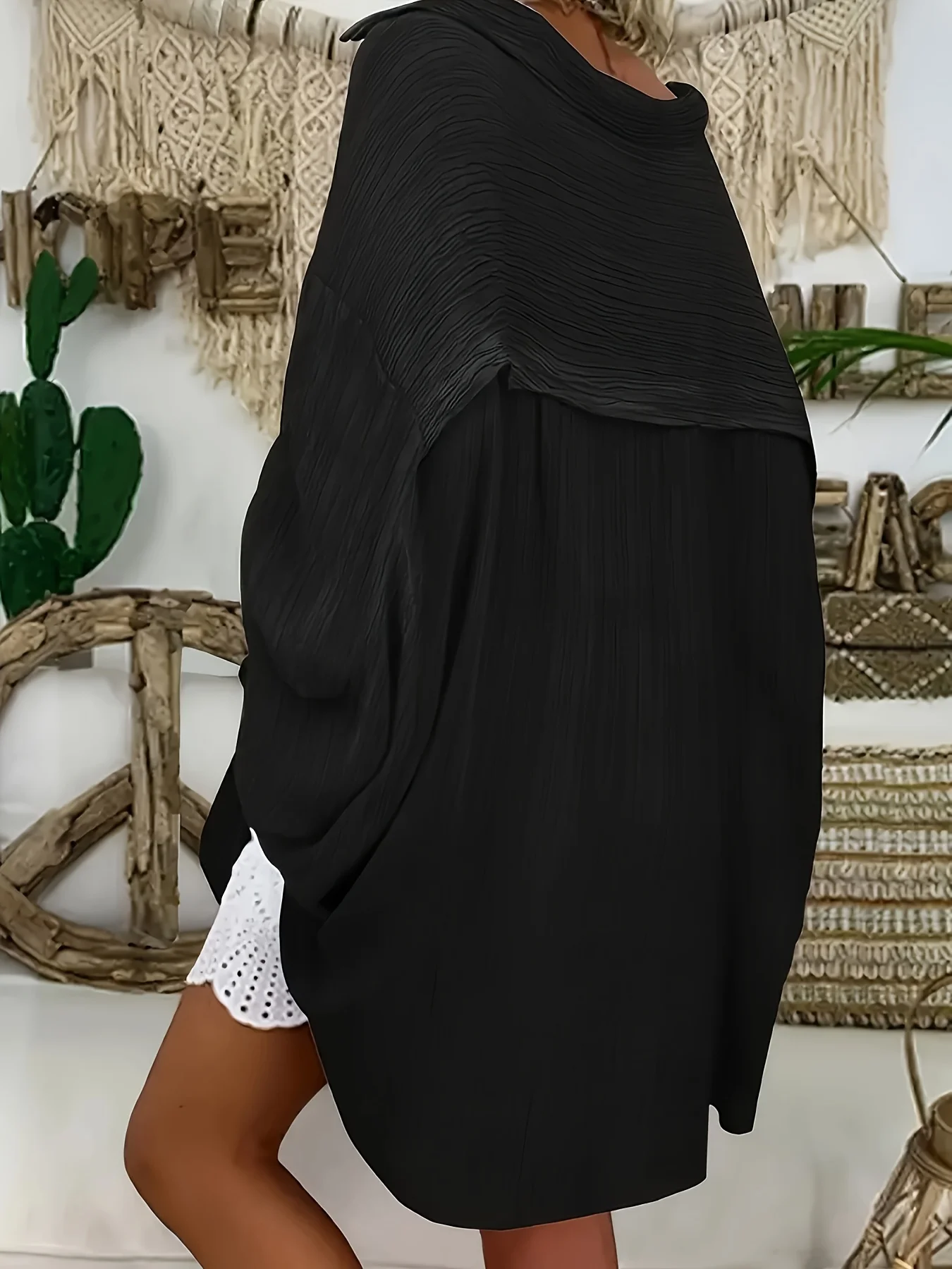 Luźna koszula z długim rękawem o swobodnym kroju, bez wysiłku przekazująca wytłoczony komfort.