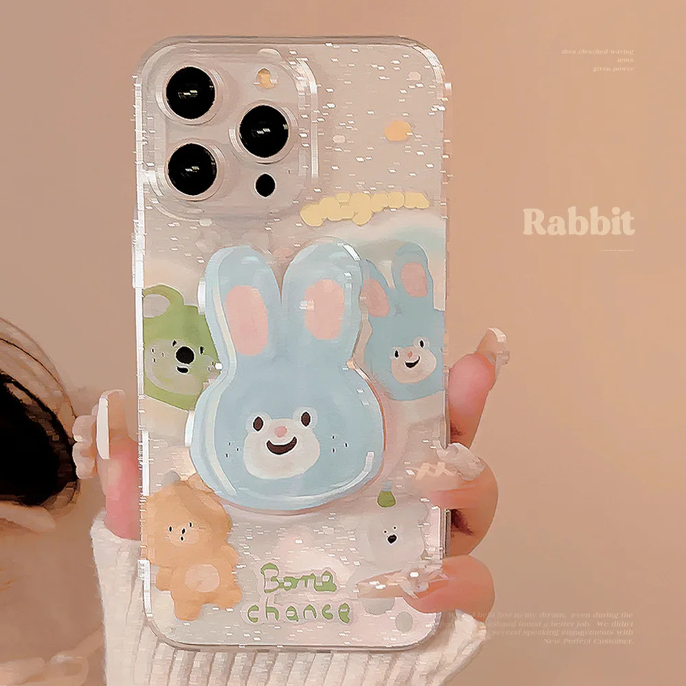 Koreanische Cartoon-Tiere glitzernd mit blauer Hase-Halterung, Handyhülle für iPhone 17, 16, 15, 14, 13, 12, 11, Pro Max, stoßfeste Softcover