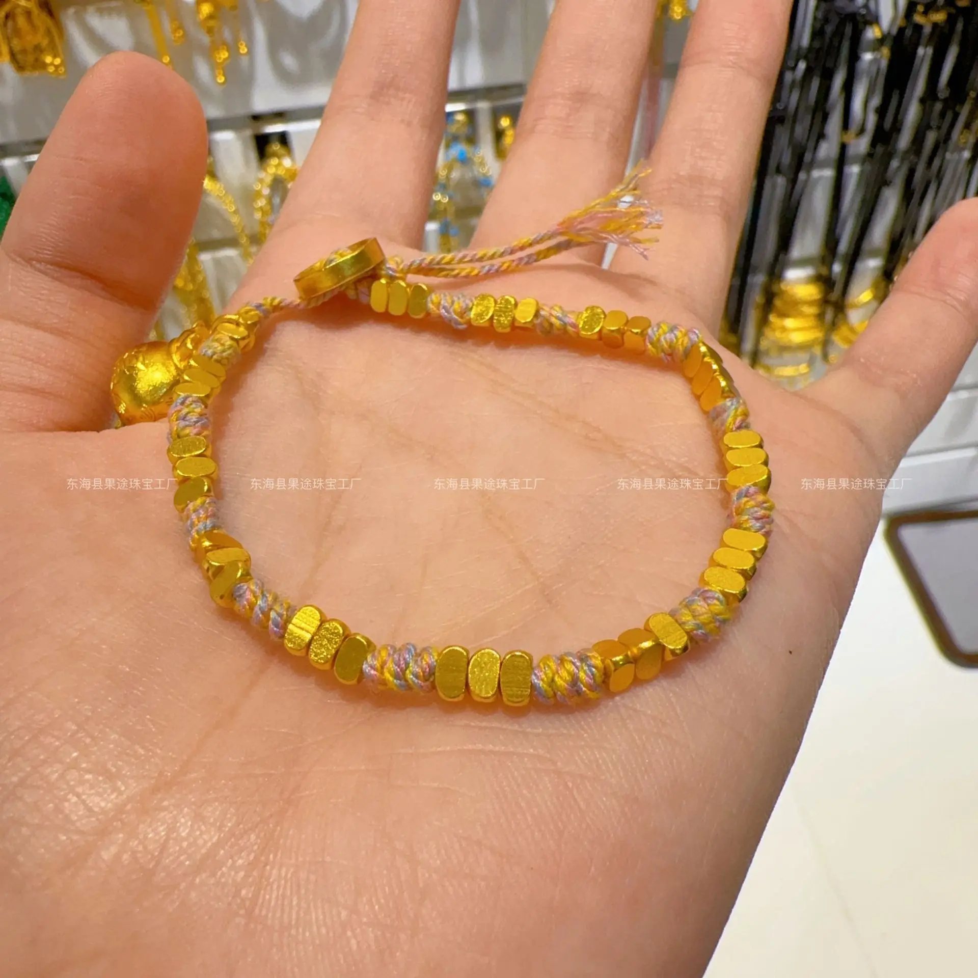 

Plated Genuine Gold Strong Preservation Ancient Method Sand Plate Wrapped With Lucky Bag Money String Hand Woven Girls Gift