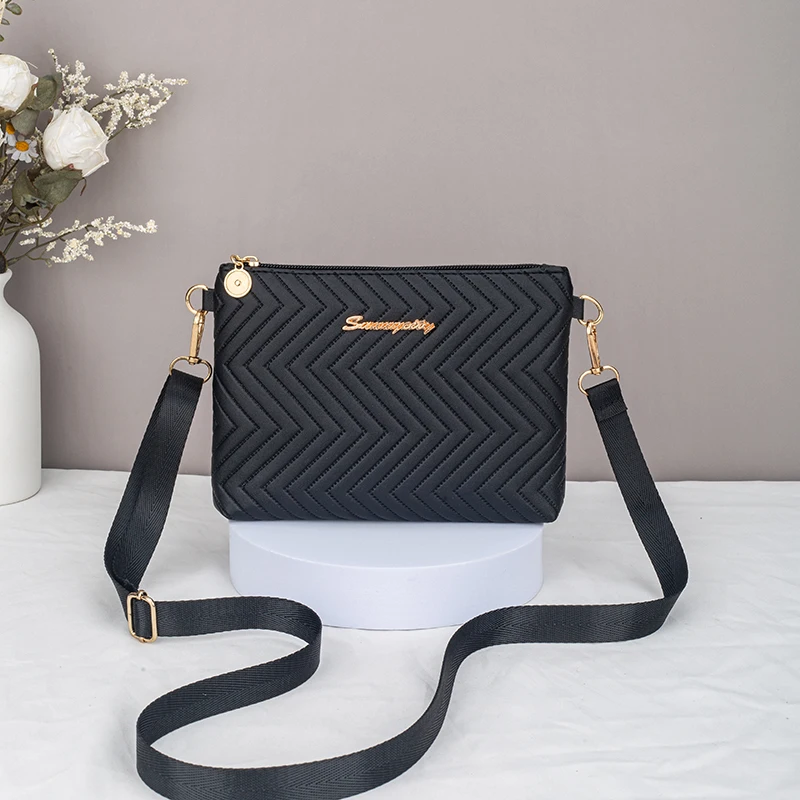 

Casual and elegant herringbone patterned S-shaped shoulder bag, makeup bag, solid color vertical version, water ripple crossbody
