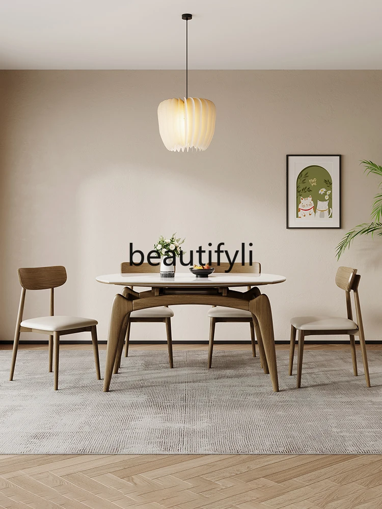 

Cream wind rock slab dining table modern simple light luxury Italian simple French retro