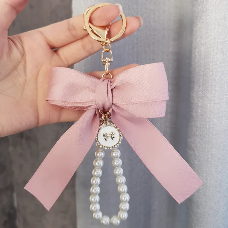 Mobile Phone Lanyard Short Wrist Strap Girlish Temperament Small Fragrance Wind Bow Pearl Pendant High-end Key Chain Universal