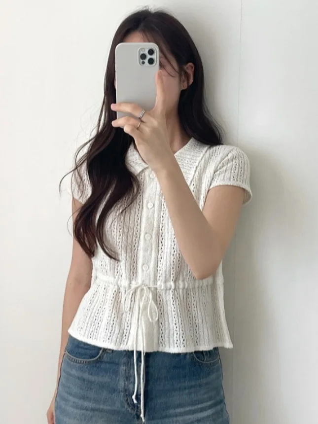 เสื้อถักคอวีผูกเอวสไตล์วินเทจใหม่ประจำฤดูร้อนปี 2025 จากทงแดมุน เสื้อสเวตเตอร์สไตล์เกาหลีสำหรับผู้หญิง ทรงหลวมทันสมัย