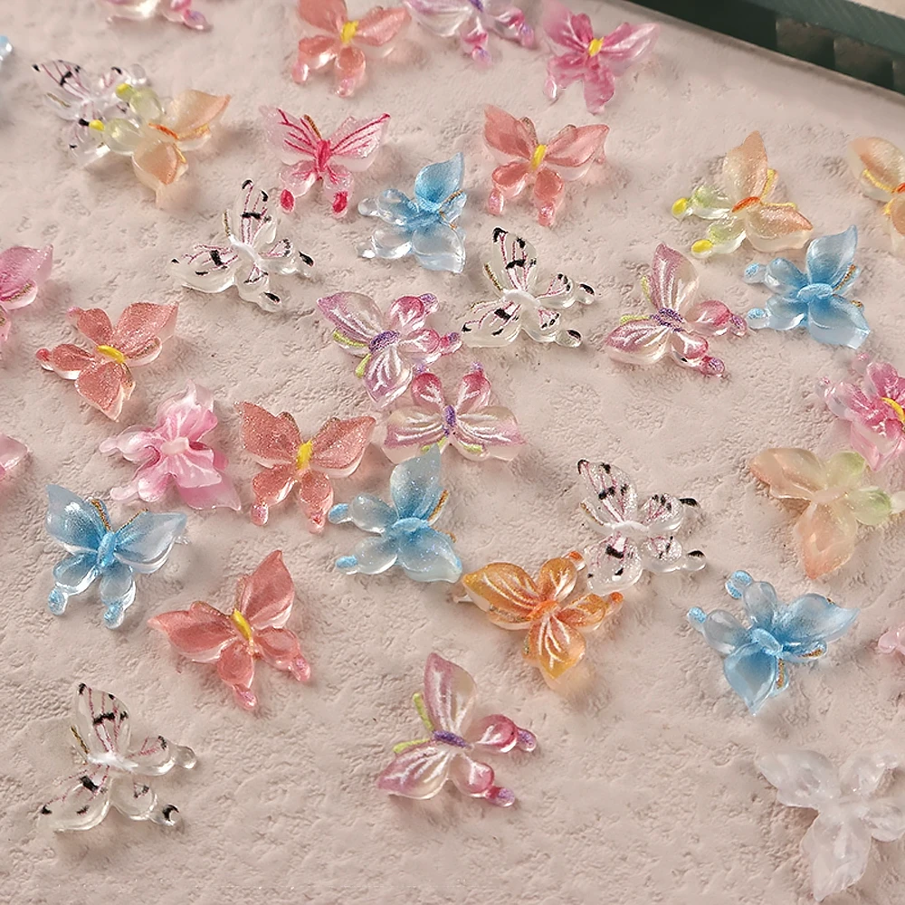 50 szt. Mieszane Aurora Gradient Motylki Żywiczne Ozdoby do Paznokci Flatback Mini Kryształowe Motyle Dekoracje do Paznokci 3D DIY Figurki Części