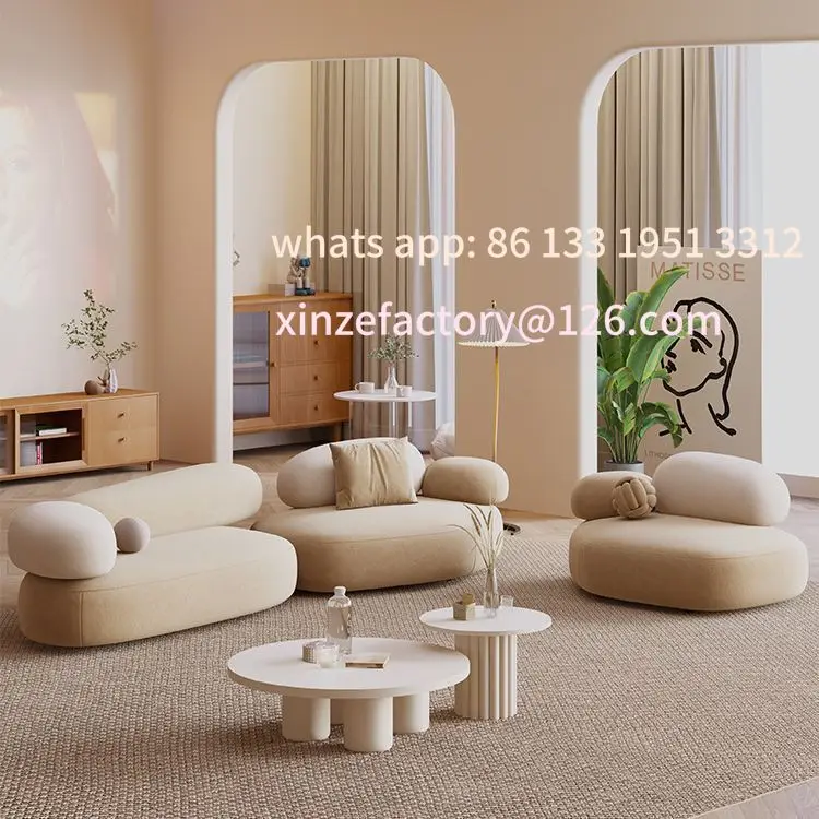 

Customizable pebble cream fabric sofa small apartment living room table and chairs beauty shop lounge area reception sofa