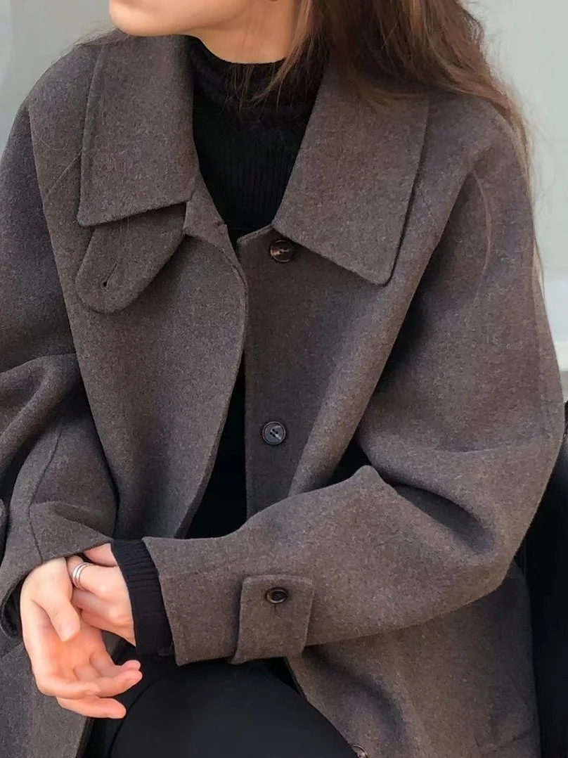 เสื้อโค้ทขนสัตว์ทรงยาวปานกลาง ปกพับติดกระดุมเม็ดเดียว สไตล์วินเทจ สำหรับผู้หญิง ฤดูใบไม้ร่วง ฤดูหนาว รุ่นใหม่ ให้ความรู้สึกหรูหรา สไตล์ทวี