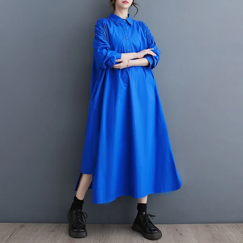 فستان ربيعي جديد بتصميم فضفاض وظهر مفتوح بلون واحد يخفي الجسم ويدبّر القوام بطول متوسط من القطن والبوليستر بتصميم A-Line