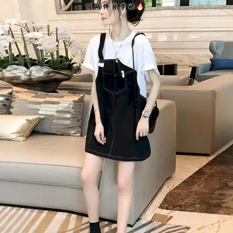 Zwarte denim bandjurk dames Franse casual nep tweedelige T-shirtjurk modeontwerp losse zomertrend dunne oversized jurk