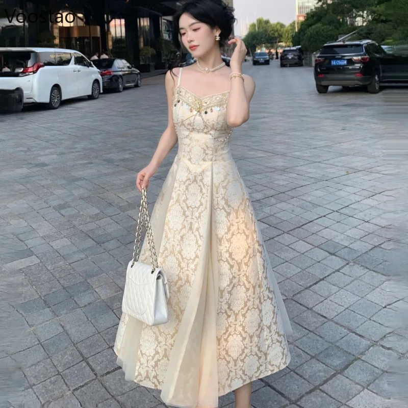 フレンチエレガントな海辺のホリデーパーティードレス女性甘いスパンコールパールチェーン妖精ロングドレスレディースビーチ自由奔放に生きる誕生日ドレス