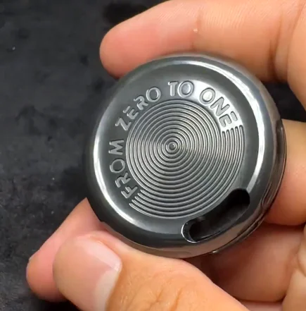Space-time badge mechanical ratchet coin can be pressed 01edc fingertip gyro metal decompression toy.