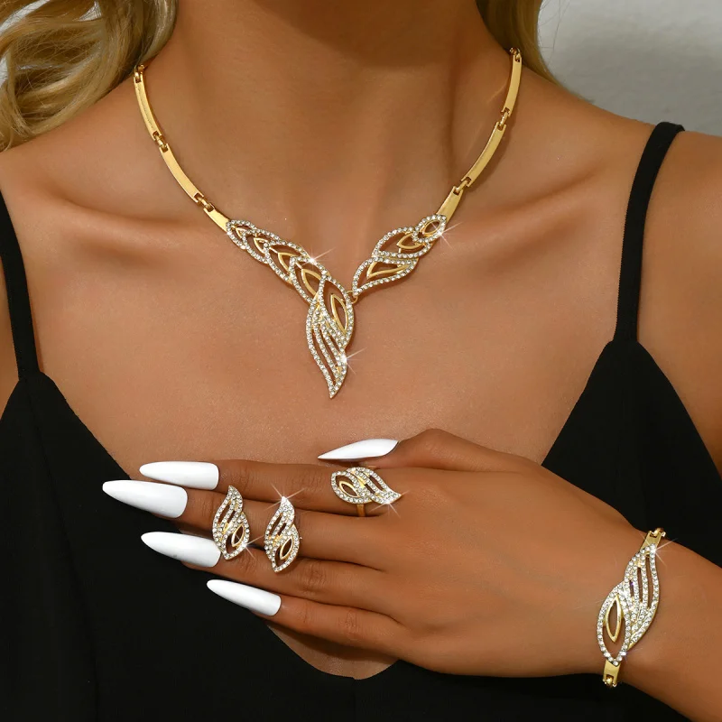 

Cross-Border Fashion Exaggerated Inlaid Gold Leaf Necklace Earrings Ring Bracelet Four-Piece Set Women's Wedding Accessories