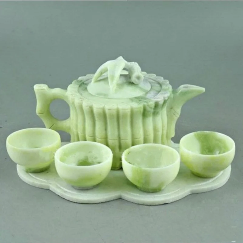 

A tea set carved from Lantian jade China Kung Fu Tea Five piece set teapot bowl Creative gift