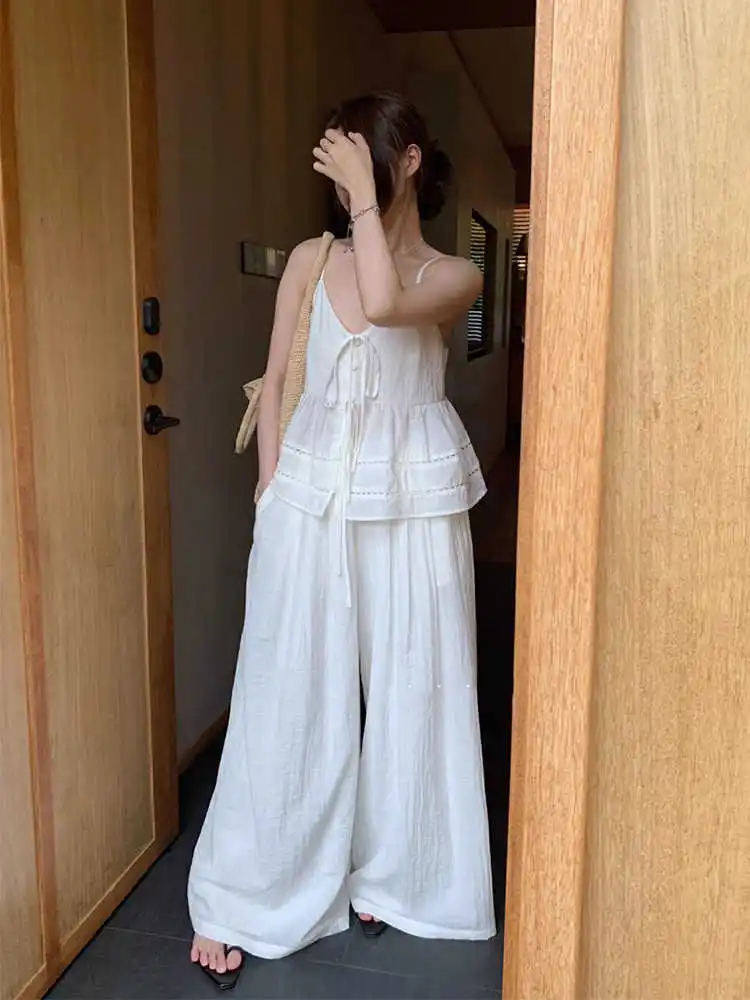 

Clothland Women Stylish Lace Up Camis Pants Suit V Neck Spaghetti Strap Shirt Wide Leg Trousers Summer Two Piece Set TA616