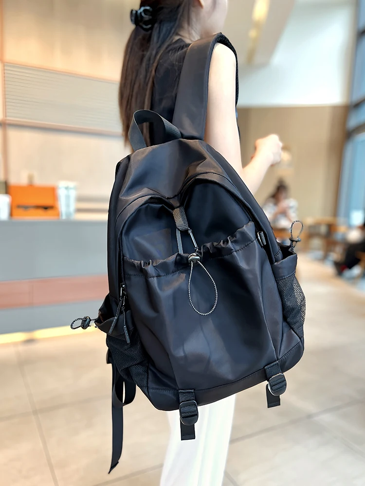 

2025 Простые универсальные водонепроницаемые дорожные сумки из ткани Оксфорд для отдыха на открытом воздухе, легкий рюкзак большой вместимости для женщин, модный