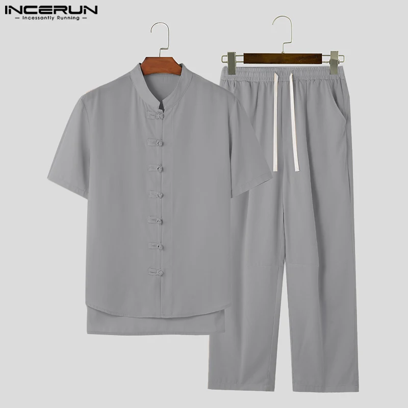 

INCERUN 2023 Chinese Style New Men's Casual Sets Stand Neck Knot Button Short Sleeved Shirts Drawstring Pant Suit 2 Pieces S-5XL