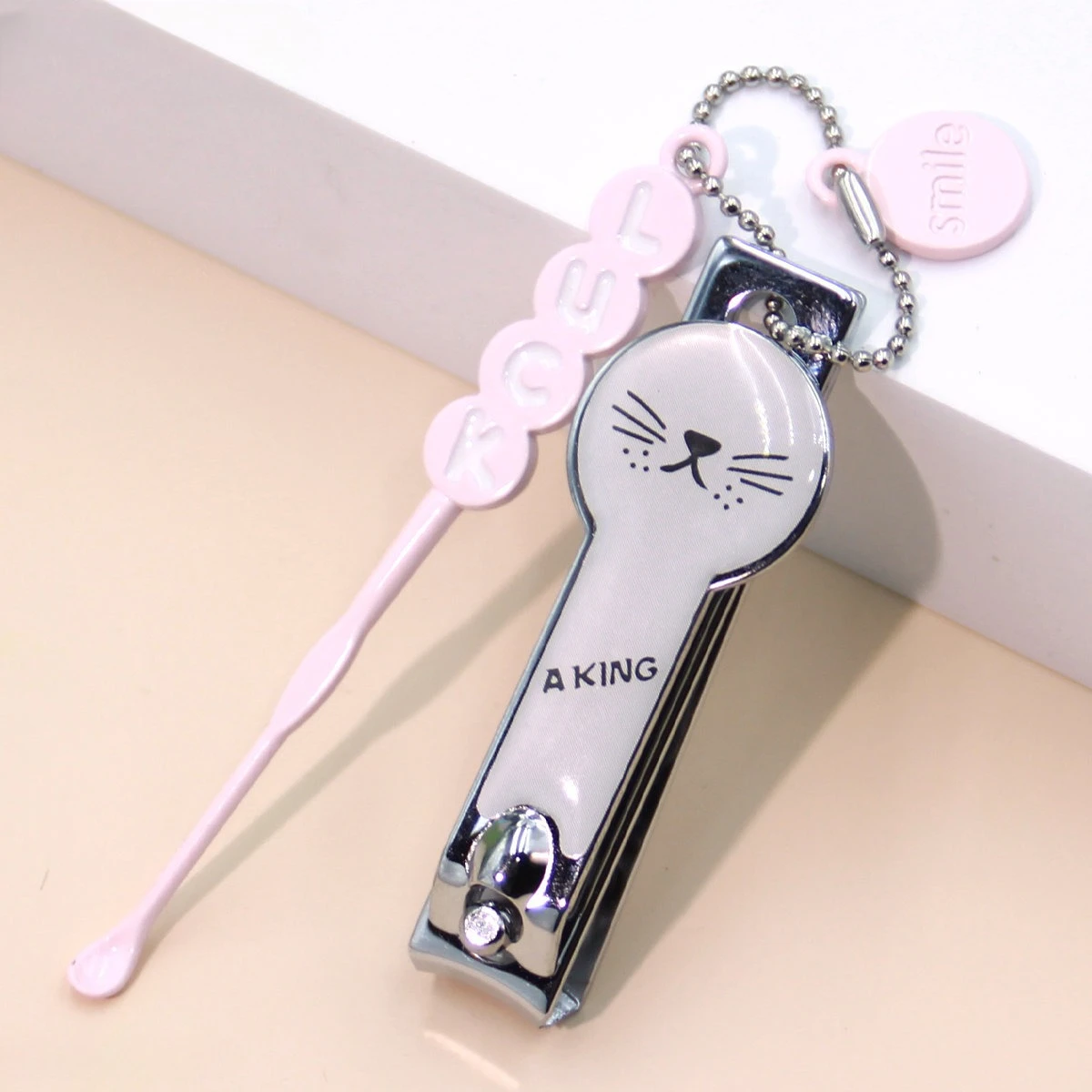 2 sets of cartoon flat-nose nail clippers, with ear scoops for easy portability