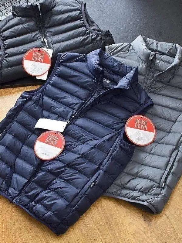 

Мужской легкий теплый пуховый жилет из хлопка: модный тренд осени-зимы, свободный крой, для повседневного использования