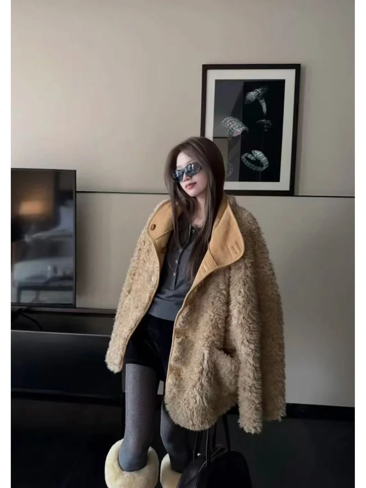 الرجعية Sle المرأة طويلة Sve Jaet فضفاضة تناسب زر واحد إغلاق الدافئة الجلد المدبوغ معطف فرو الضأن Dongda بوابة خمر الرياح