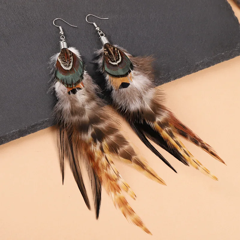 Pendientes de plumas exagerados únicos, pendientes largos de plumas creativas, pendientes grandes bohemios de moda, joyería llamativa para mujer al por mayor