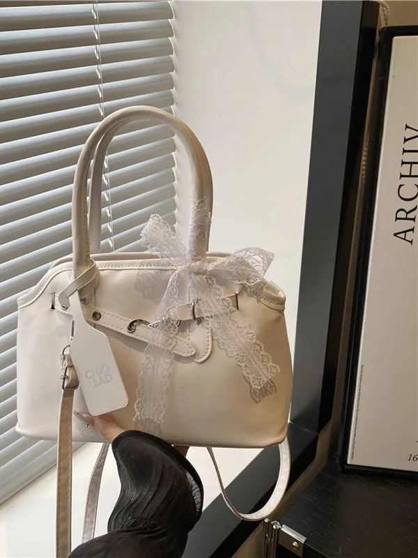 bolsa-de-ombro-transversal-feminina-versatil-2025-nova-bolsa-concha-com-laco-borboleta-e-fita-de-renda-–-estilo-fofo-e-moder