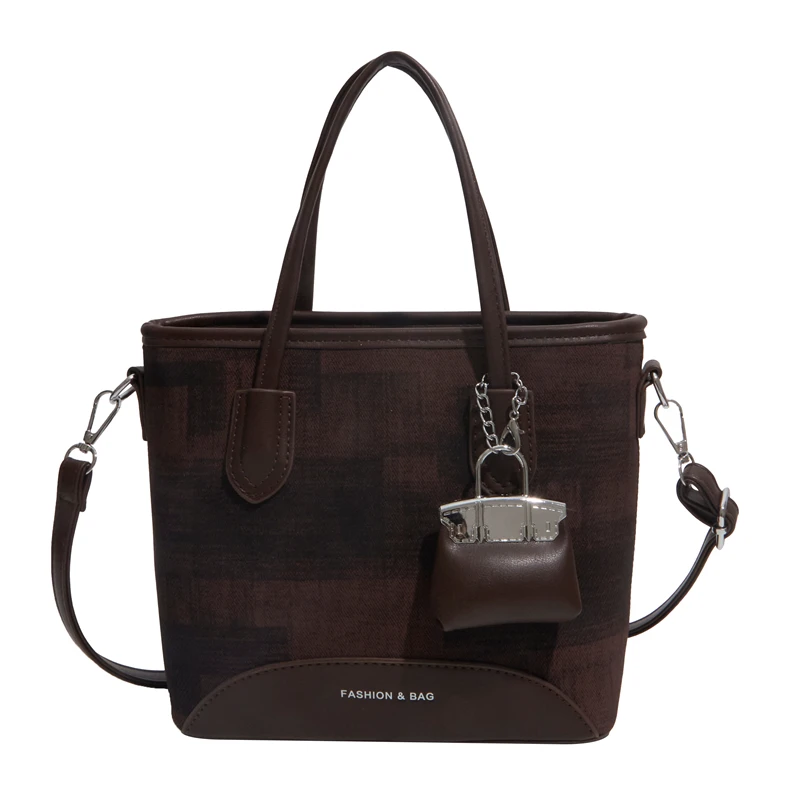 

Модная минималистичная роскошная сумка для подгузников для женщин: элегантная кожаная сумка через плечо, классическая винтажная дизайнерская сумка-тоут.