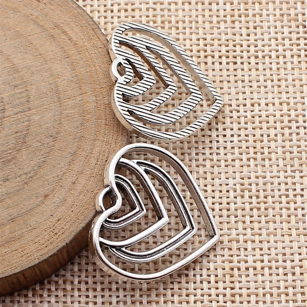 

20pcs 25x24mm(0.98x0.94inch) Antique Silver Color Hollow Heart Charms Pendants DIY Jewelry Making Accessories