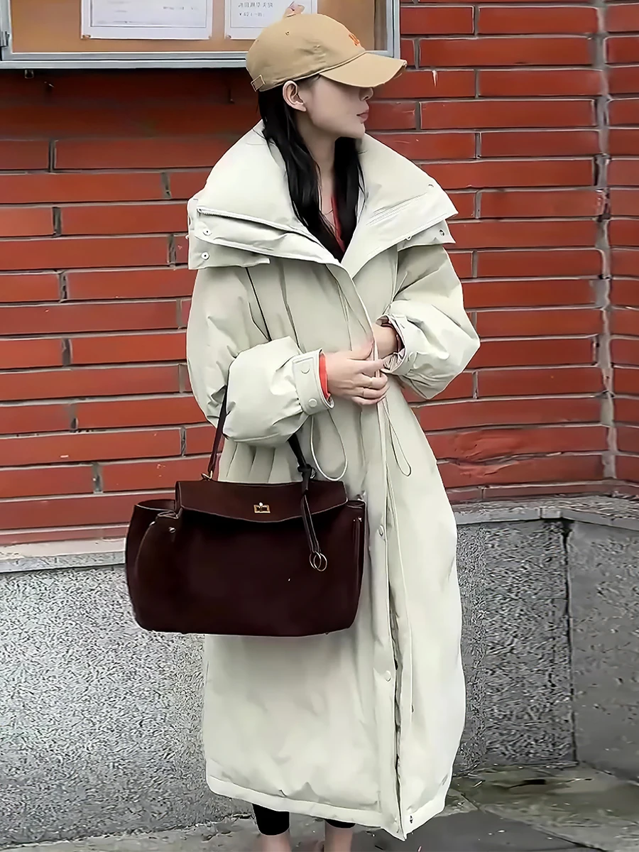 

Утепленное длинное женское пуховое пальто белого цвета с капюшоном, модная зимняя верхняя одежда для города, коллекция Зима 2024