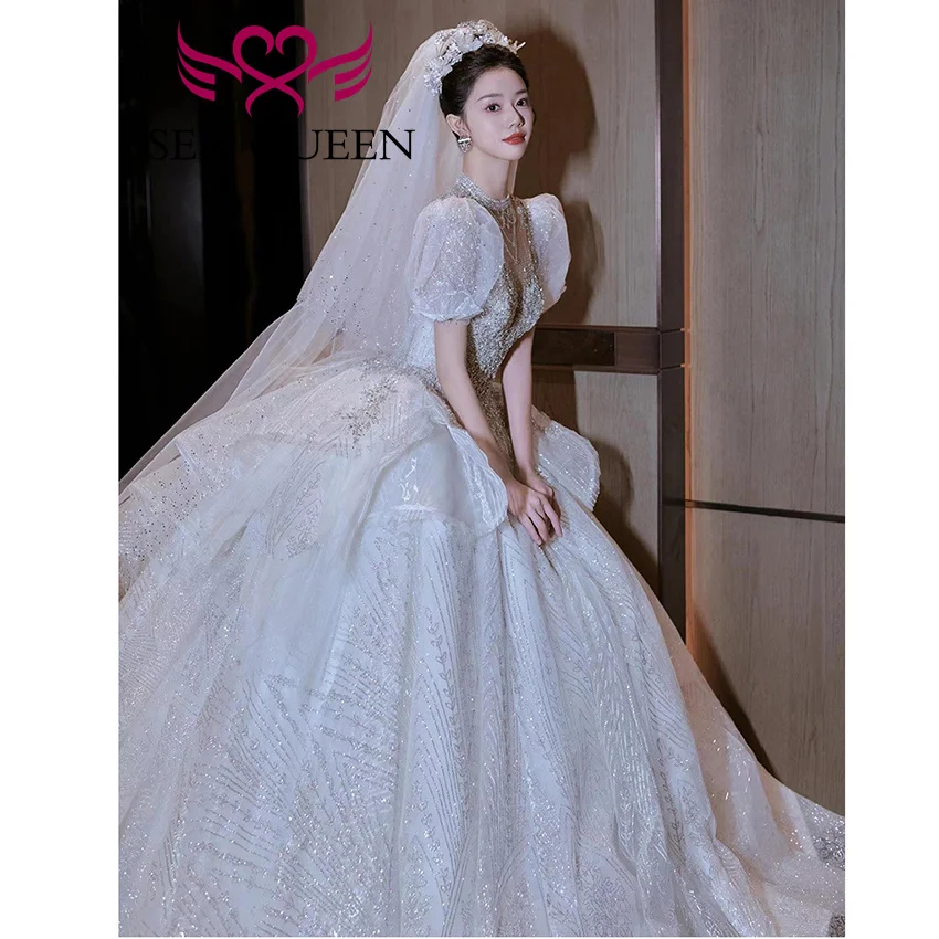 カスタマイズされたクリスタルビーズレースアップリケウェディングドレスボールガウン2025新作高品質シャイニーチュールボールガウンブライダルドレスWX0471