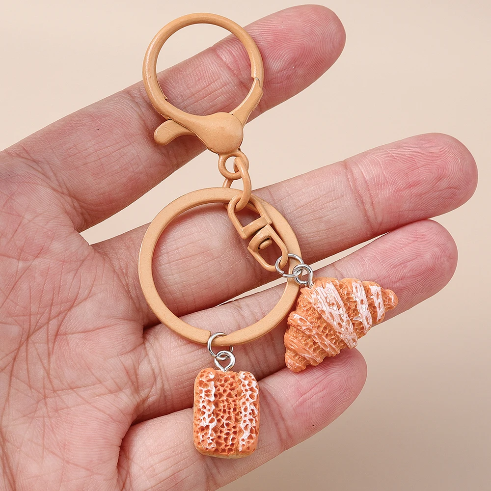 Niedlicher Schlüsselanhänger in Form eines Brotbrotes, Croissant- oder Butterbrot-Designs, für Damen und Herren, als Anhänger für Handtaschen, zum Selbergestalten von Schmuck und zur Dekoration. – Detail 9