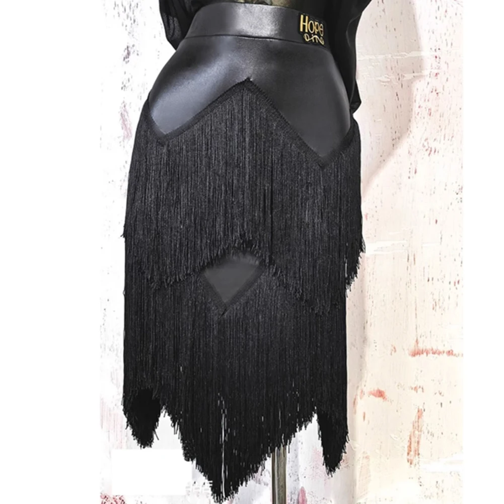 تنورة تانجو فستان قاعة الرقص النسائية الجديدة من الجلد الصناعي، تنورة سامبا سوداء اللاتينية لأداء الفريق، تنورة شرابة