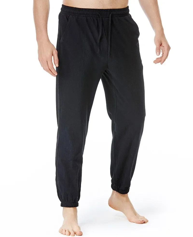 Pantaloni da jogging di alta qualità da uomo Casual primavera estate pantaloni con coulisse in tinta unita pantaloni larghi con tasche a vita media per