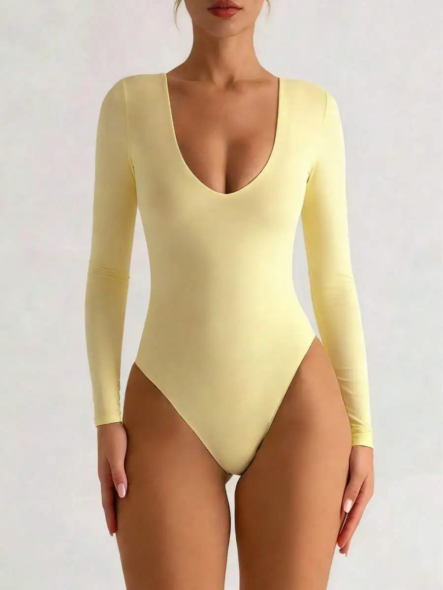 

Женское боди с длинным рукавом и глубоким V-образным вырезом - мягкая эластичная ткань