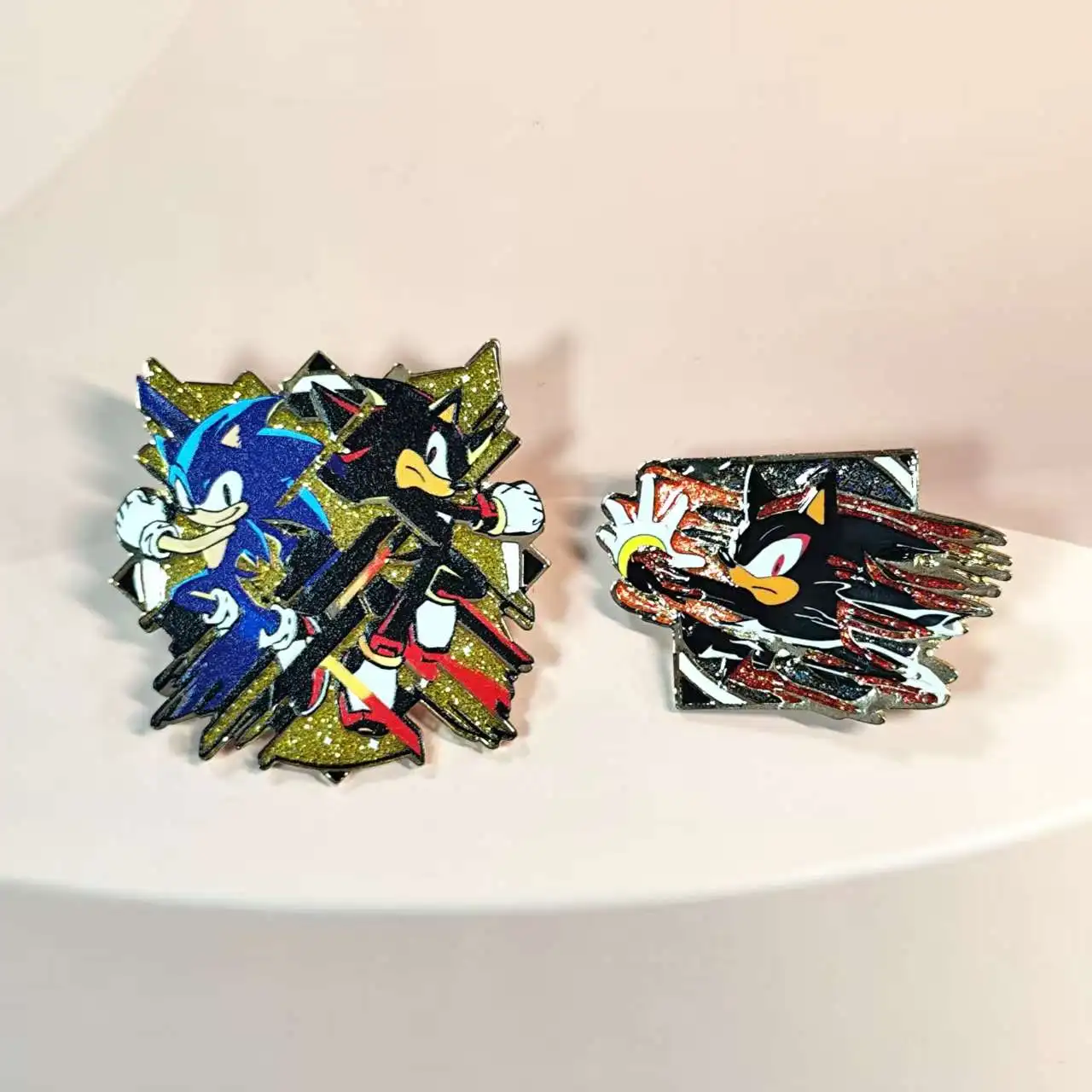 Enamel pins with dynamic  characters, glittery details. Perfect for adding a fun, stylish touch to outfits.