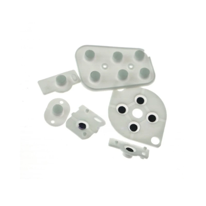 Yuxi แผ่นรองกุญแจ N64, แผ่นยางรองปุ่มนำไฟฟ้าแผ่นยางซิลิโคนสำหรับเปลี่ยนตัวควบคุม1ชุด