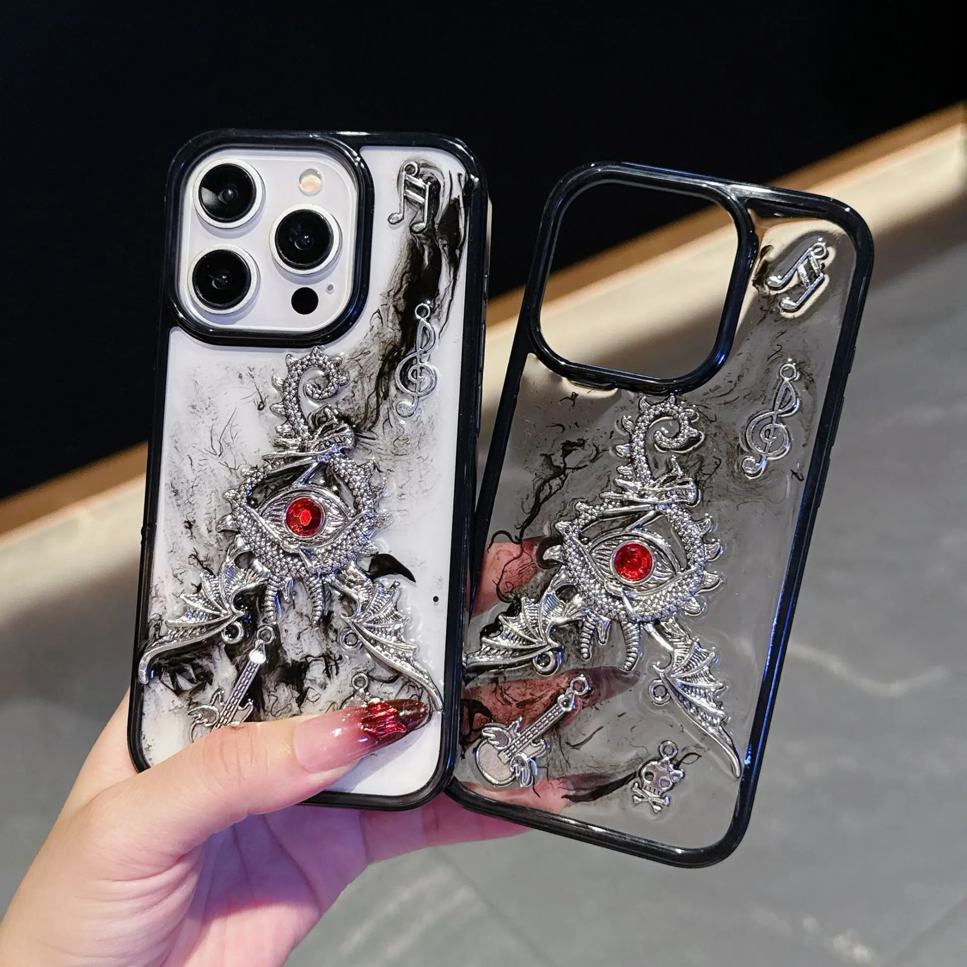 

Suitable for iPhone 17 Ruby Devil's Eye Wings Phone Case 16promax Dark Wind 15pro All Inclusive 14 Anti Drop 13 Protective Cover